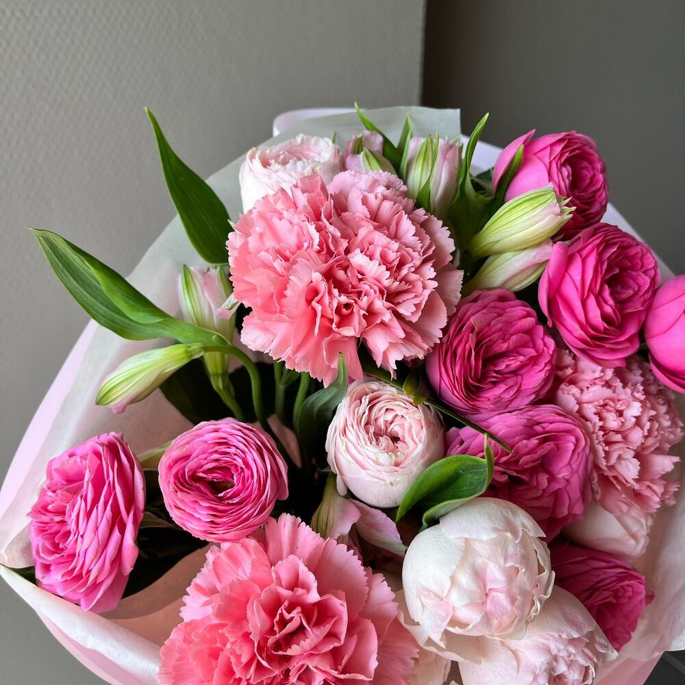 Author's bouquet with peony-shaped bush roses and dianthus