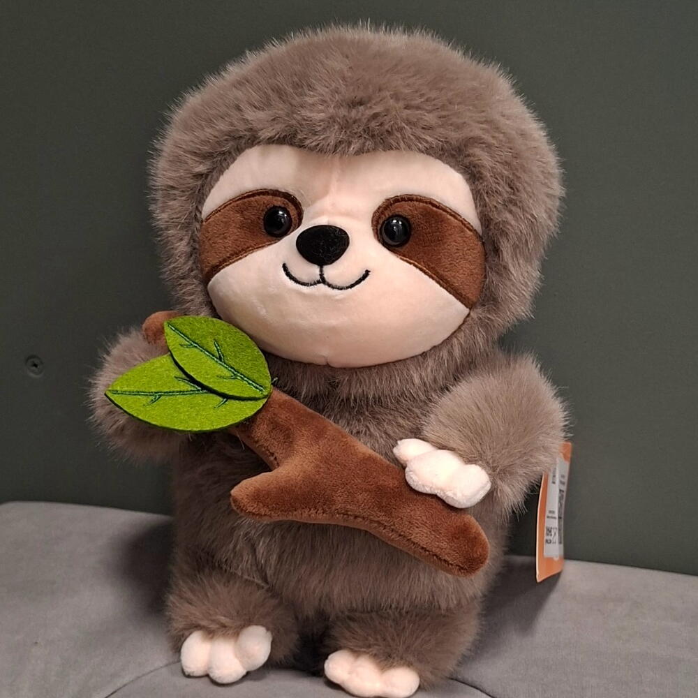 Игрушка ленивец с веткой