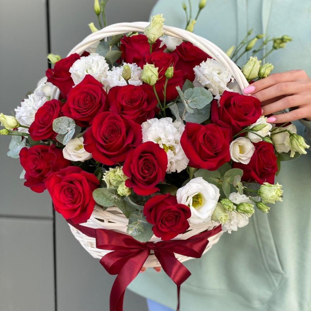Basket of red roses and eustoma Scarlet flower