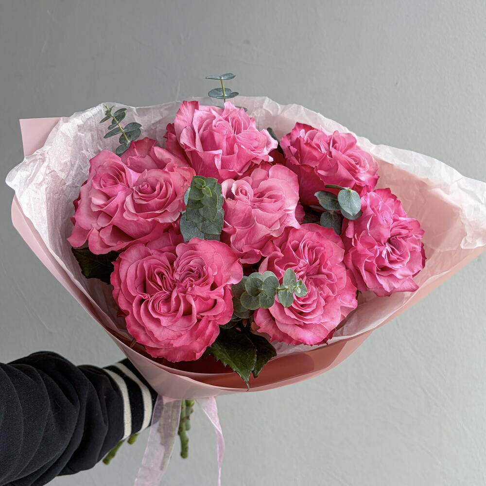 Bright bouquet with a Country Blues rose and eucalyptus sprigs