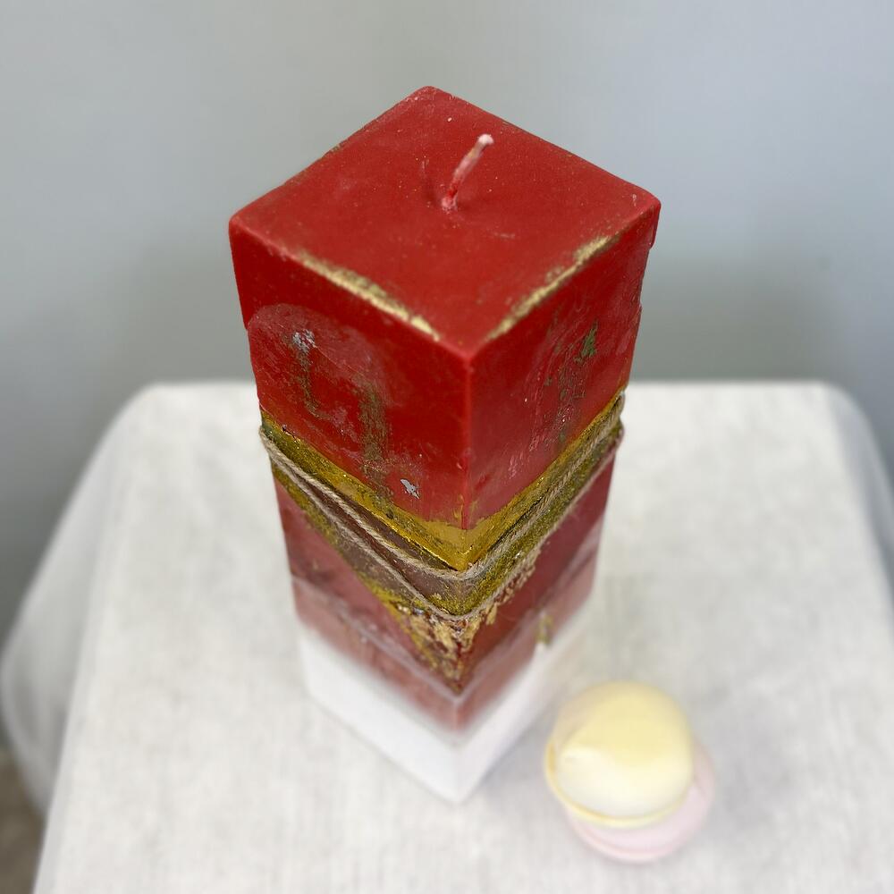 Designer red candle with gold