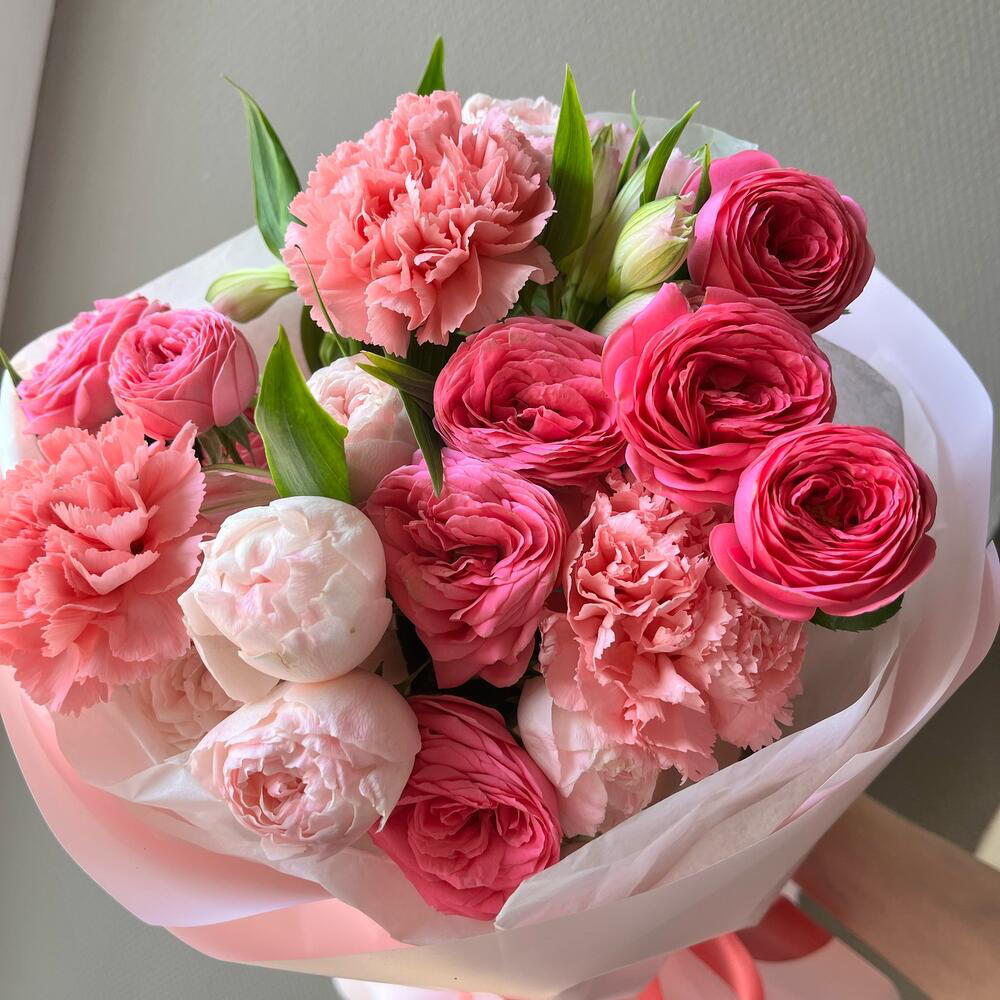 Author's bouquet with peony-shaped bush roses and dianthus
