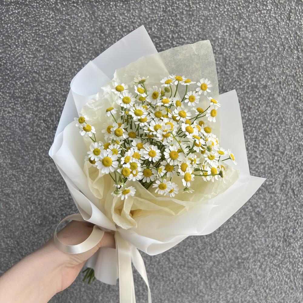 Милый малыш-комплимент из ромашек