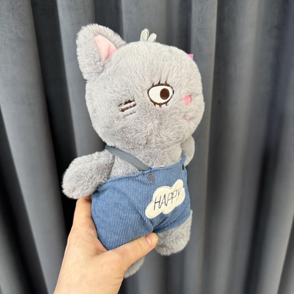 Игрушка серый кот