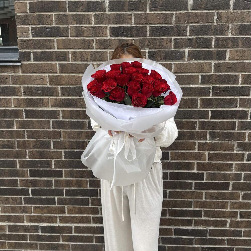 21 burgundy roses in packaging