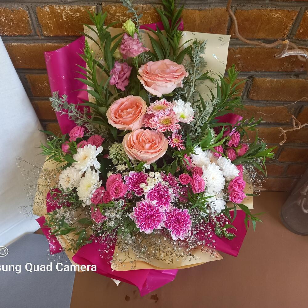 Bouquet of roses, eustoma, chrysanthemum