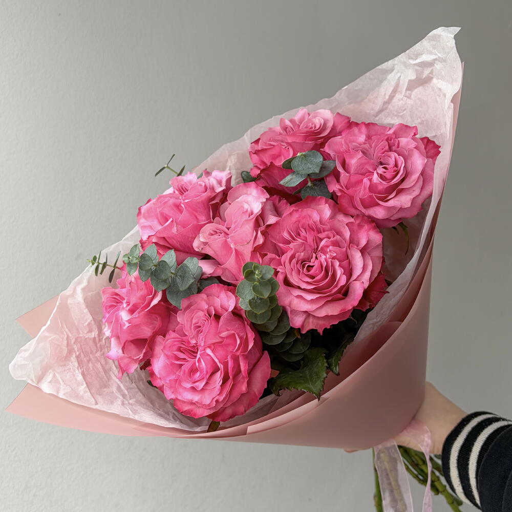 Bright bouquet with a Country Blues rose and eucalyptus sprigs