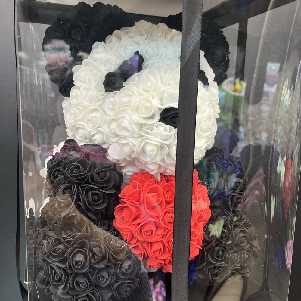 Игрушка в коробке панда