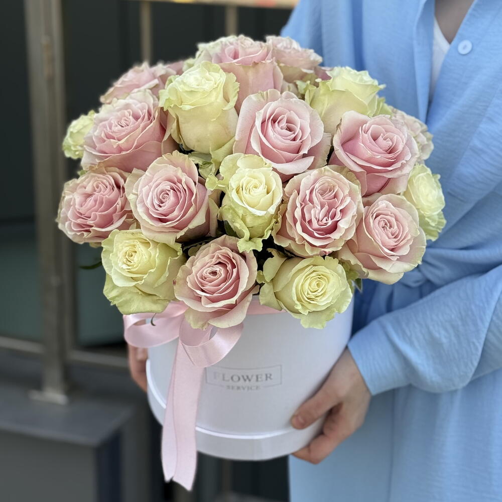 A box of tender feelings with white and pink roses