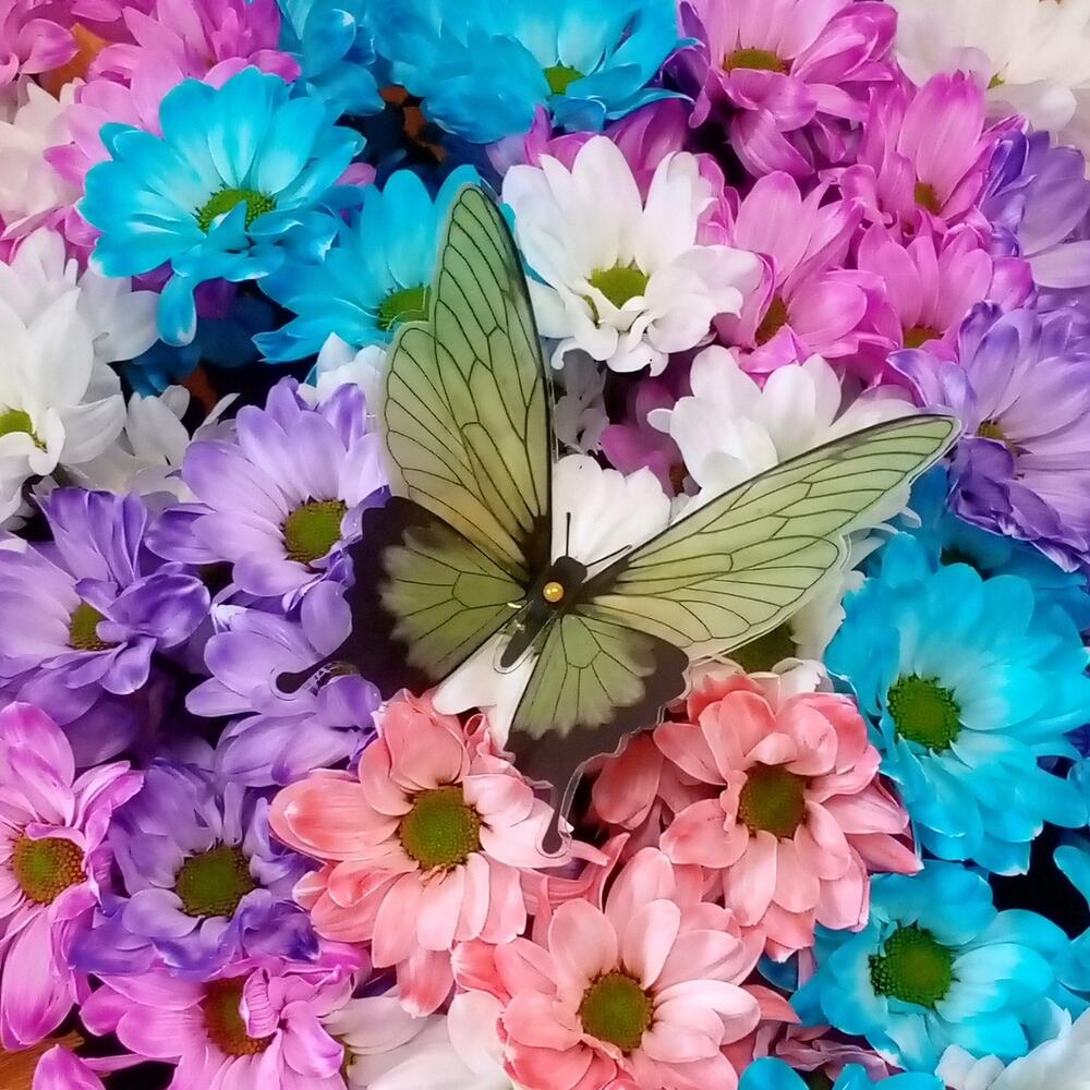 The bouquet is colorful and large