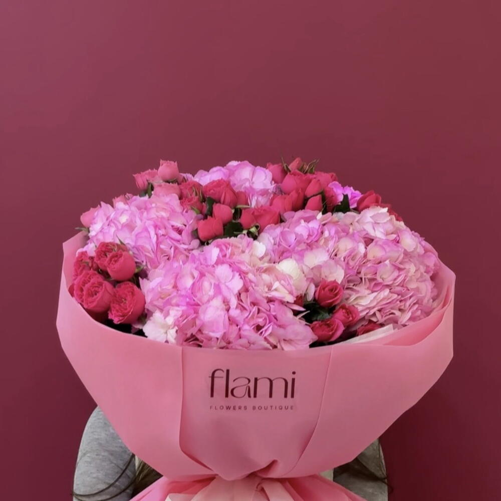 Hydrangea with a spray rose