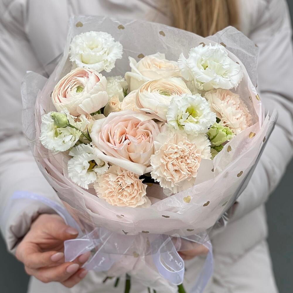 Elemis bouquet of ranunculus, Ohara and Sophie roses, eustoma, carnations and stiffs