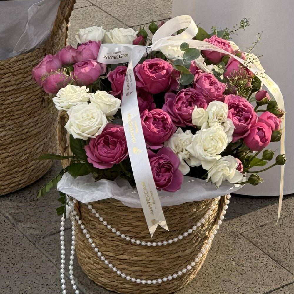 A basket of peony-like shrub roses