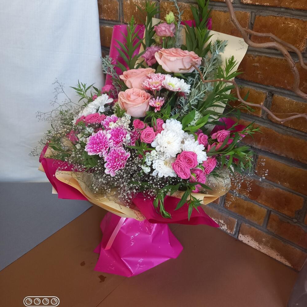 Bouquet of roses, eustoma, chrysanthemum
