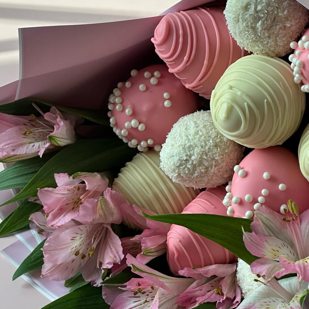 A bouquet of chocolate-covered strawberries for her