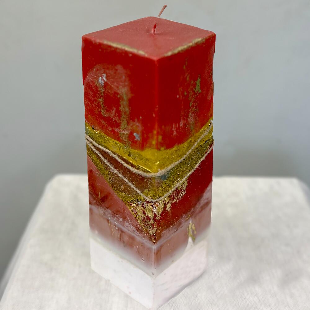 Designer red candle with gold