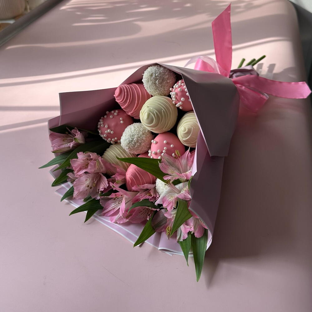 A bouquet of chocolate-covered strawberries for her