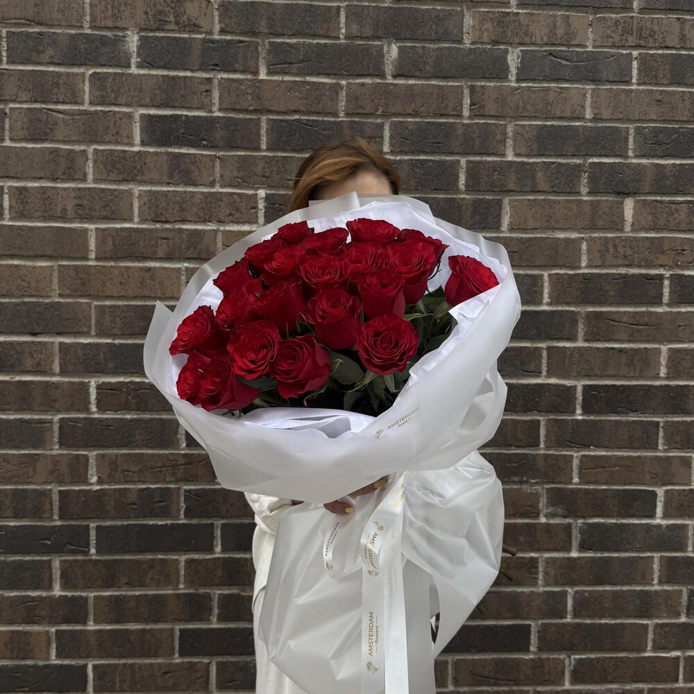 21 burgundy roses in packaging