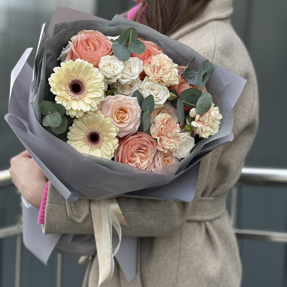 Cheryl's bouquet of gerberas, kahala roses, dianthus and bush roses