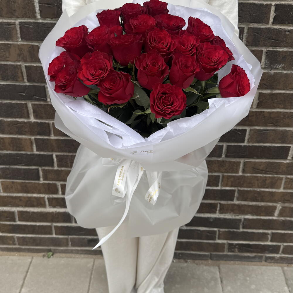 21 burgundy roses in packaging