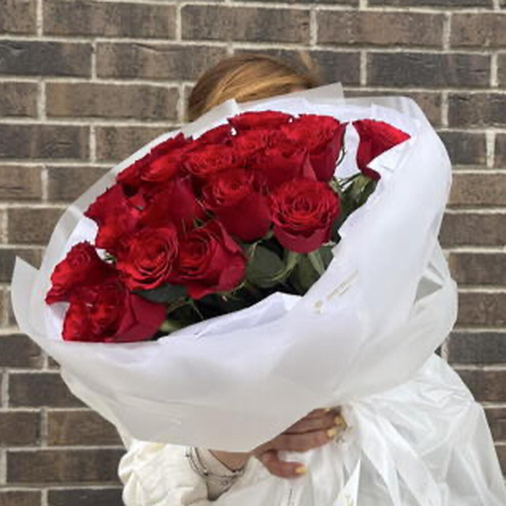 21 burgundy roses in packaging