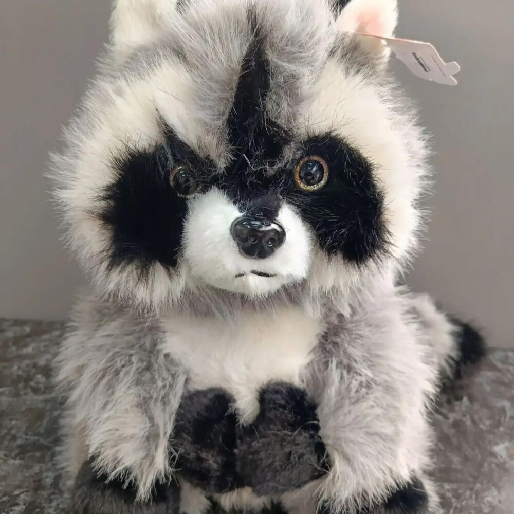 Игрушка енот