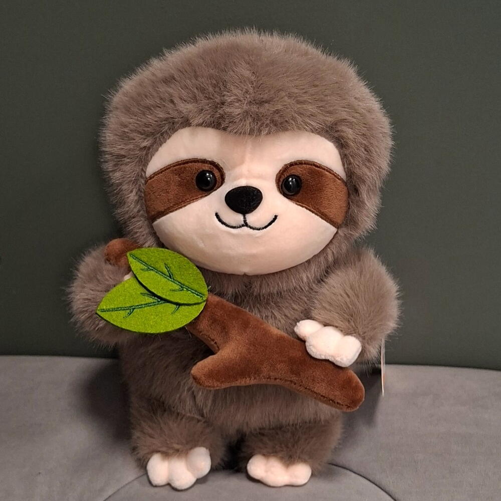 Игрушка ленивец с веткой