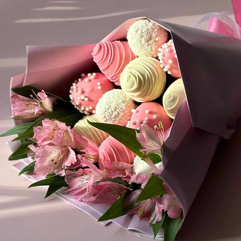 A bouquet of chocolate-covered strawberries for her
