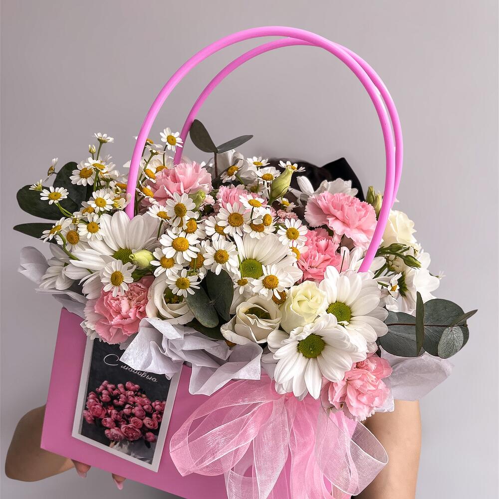 Basket with flowers and a card