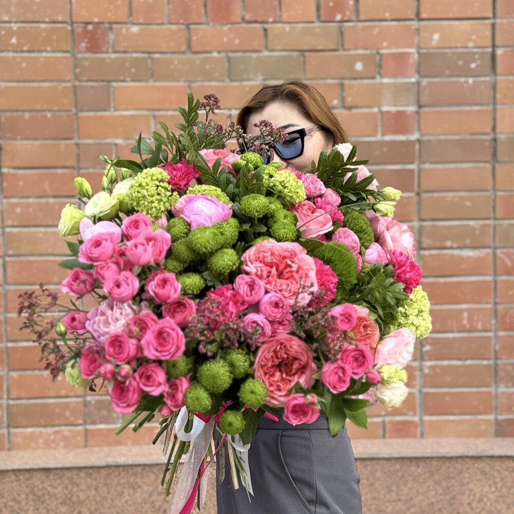 Signature bouquet with peonies and peony-style roses Bloom energy