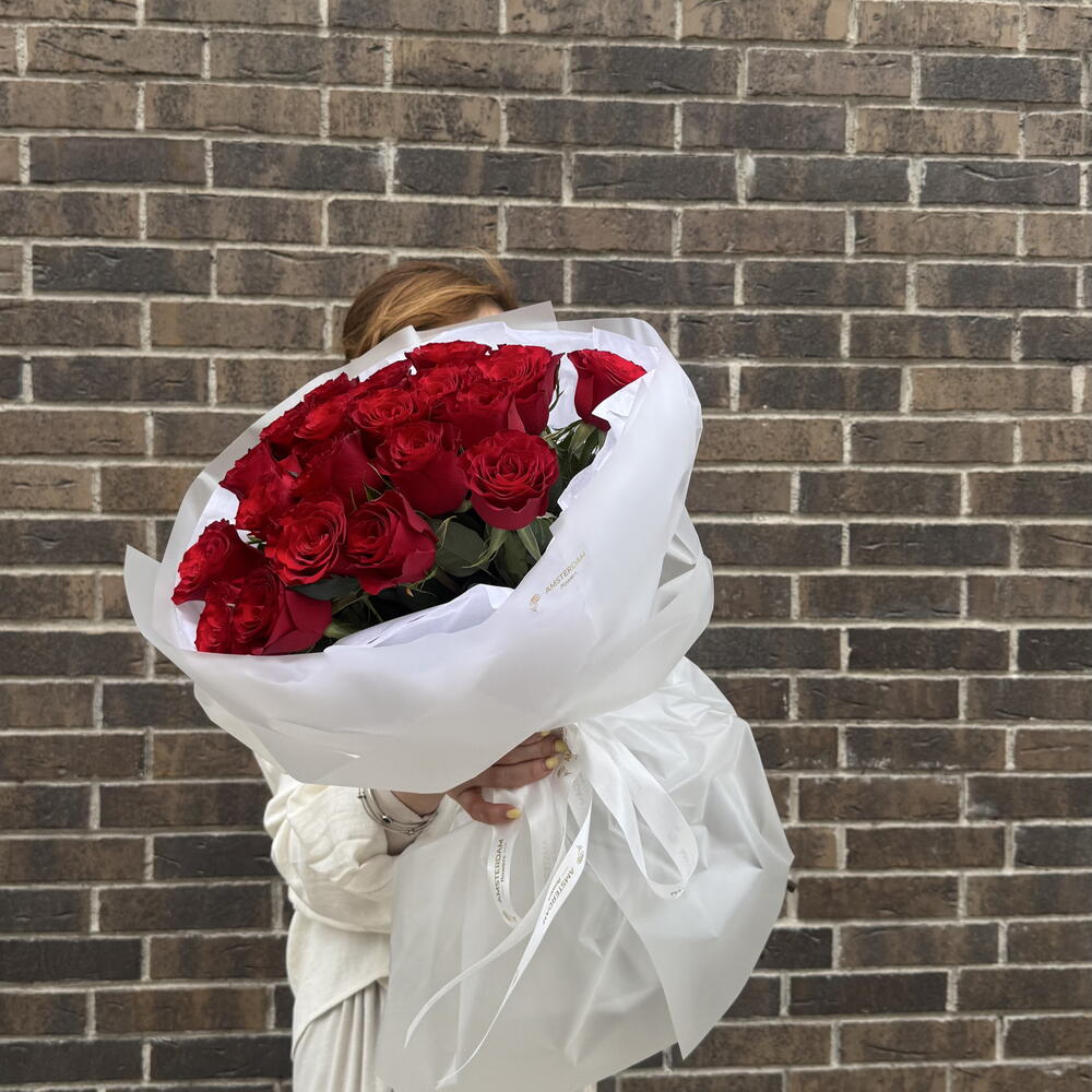 21 burgundy roses in packaging