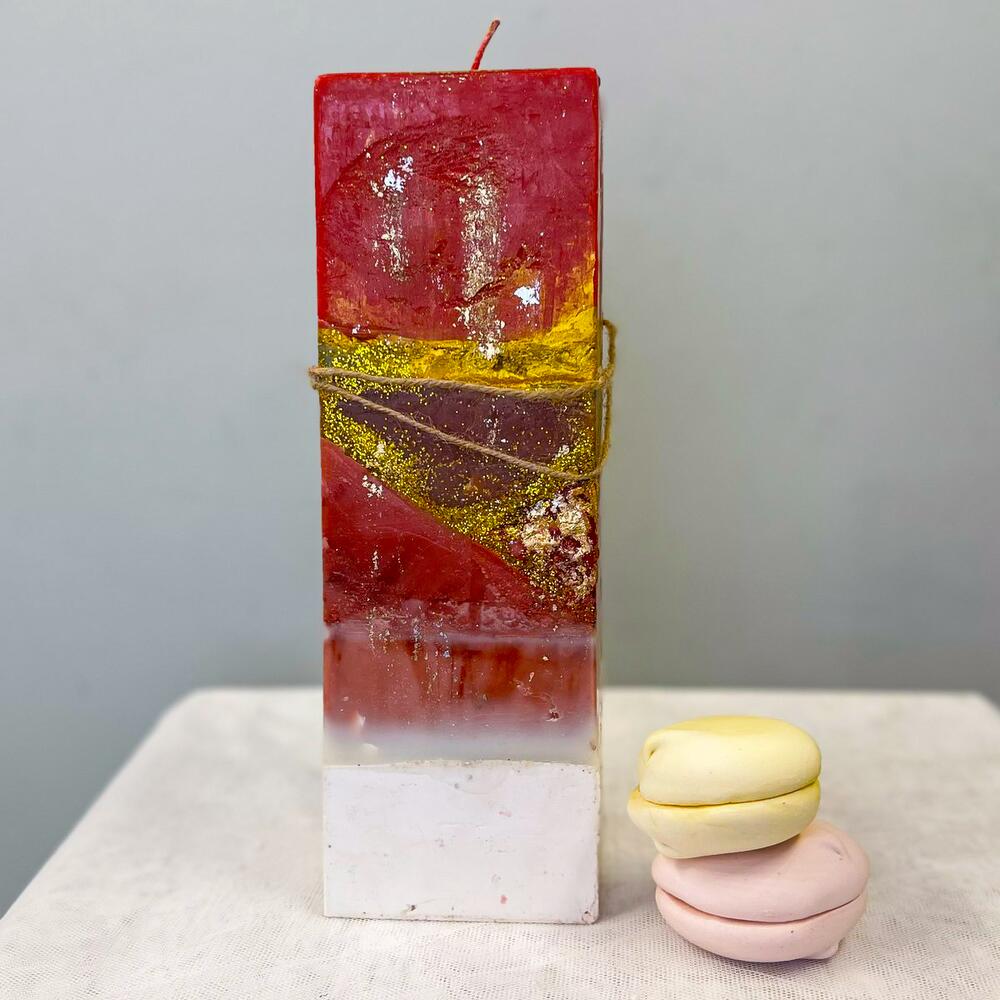 Designer red candle with gold