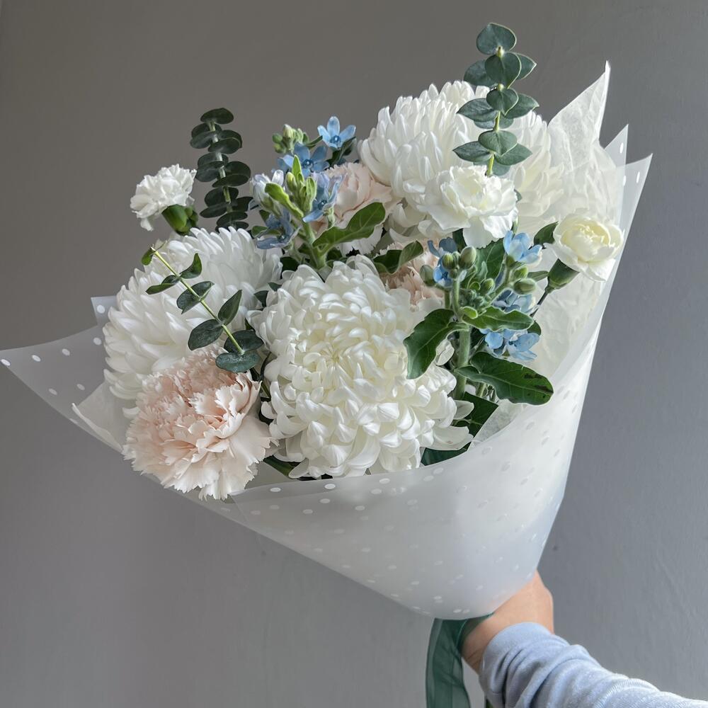 Delicate bouquet with hair curlers and dianthus