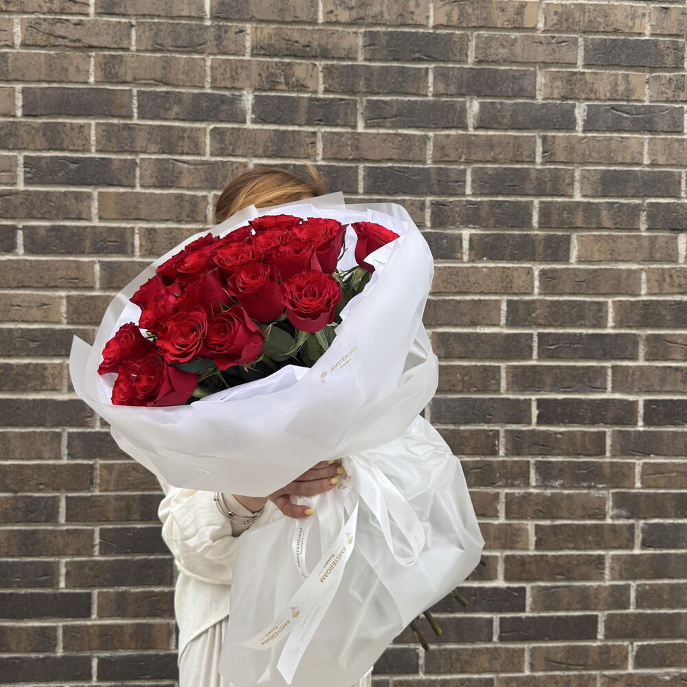 21 burgundy roses in packaging