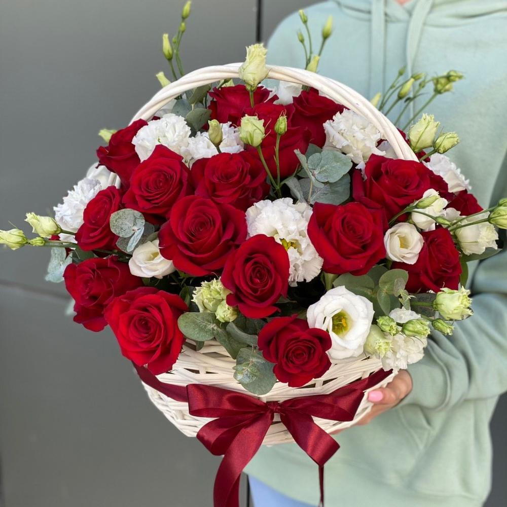 Basket of red roses and eustoma Scarlet flower