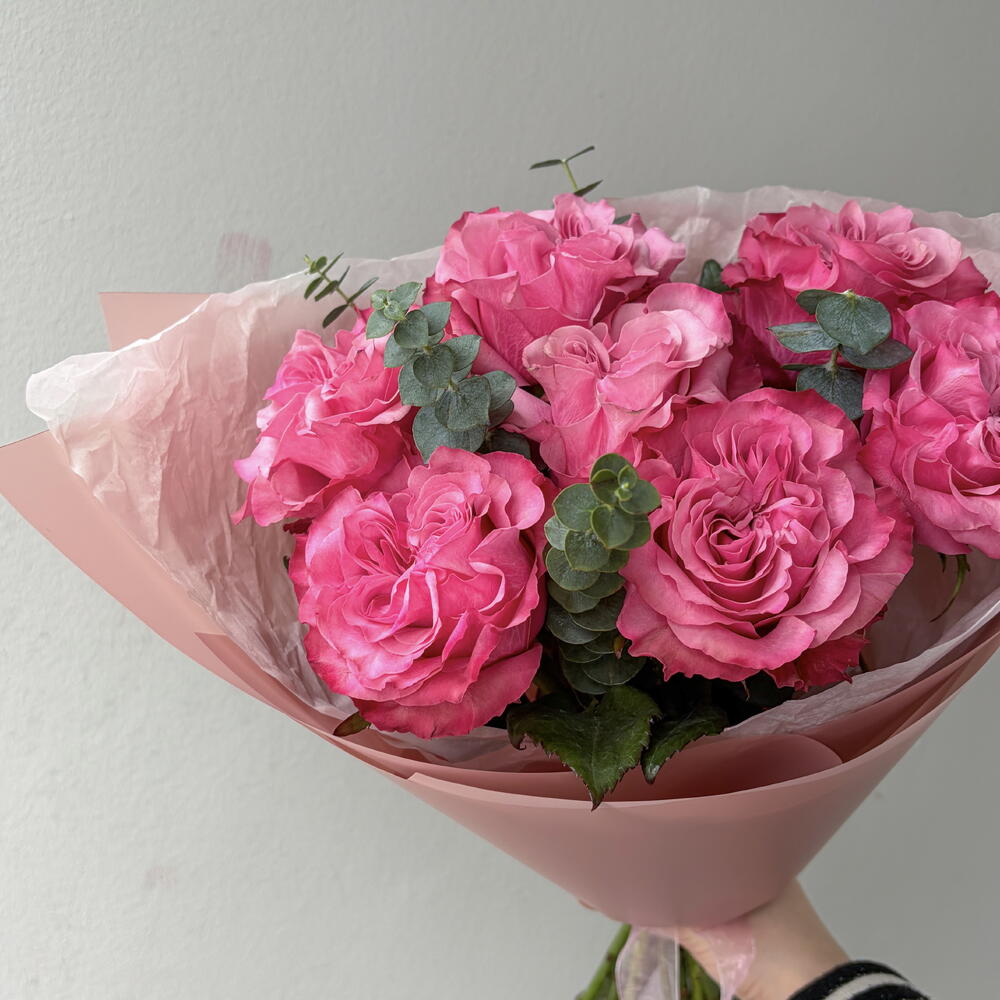 Bright bouquet with a Country Blues rose and eucalyptus sprigs