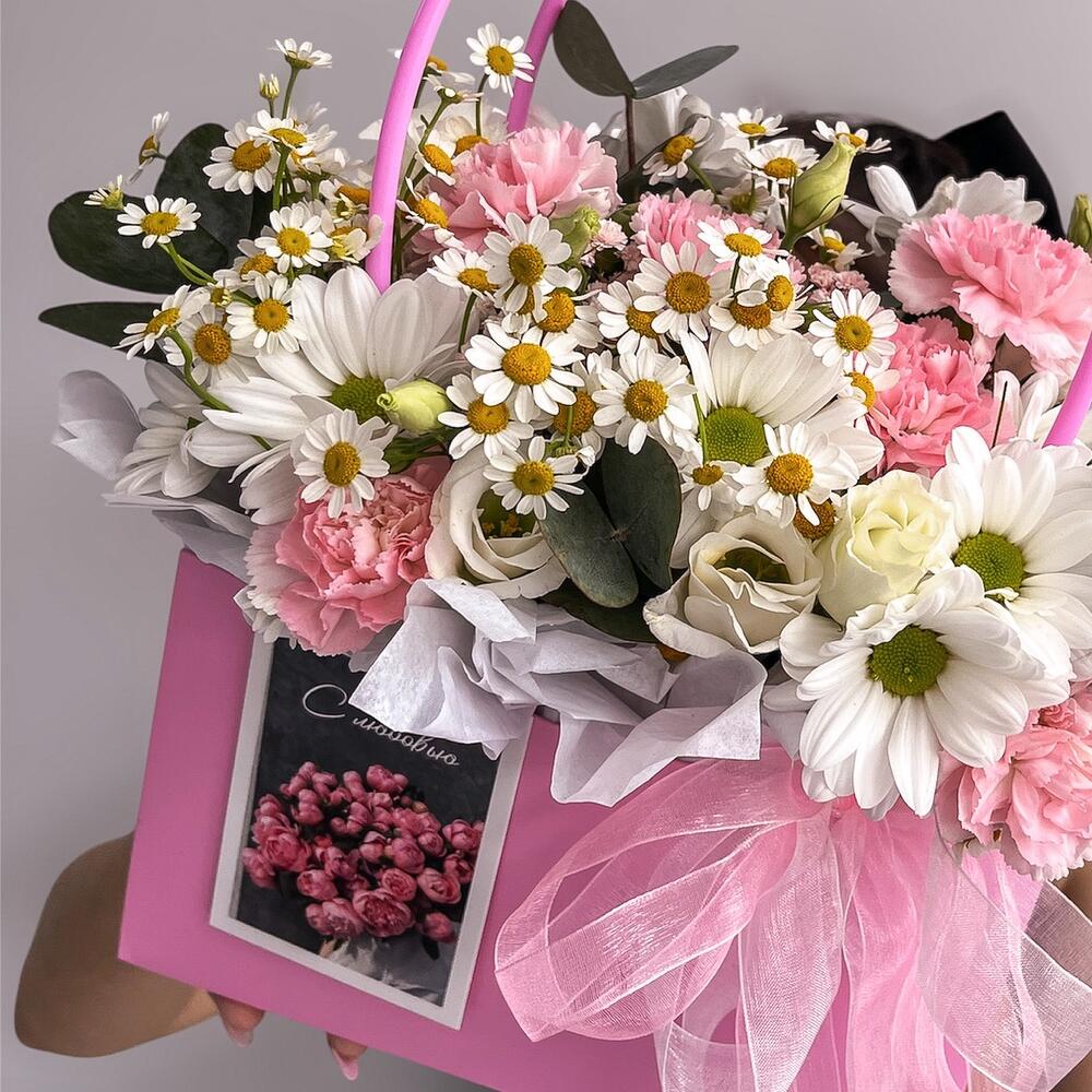 Basket with flowers and a card