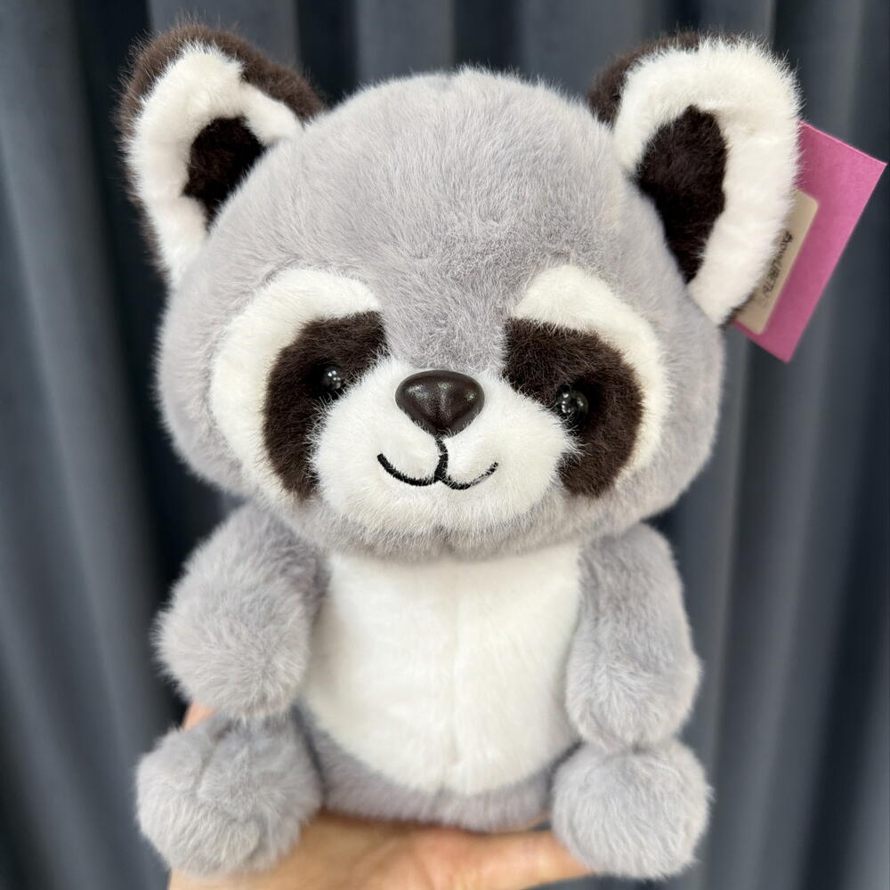 Игрушка енотик