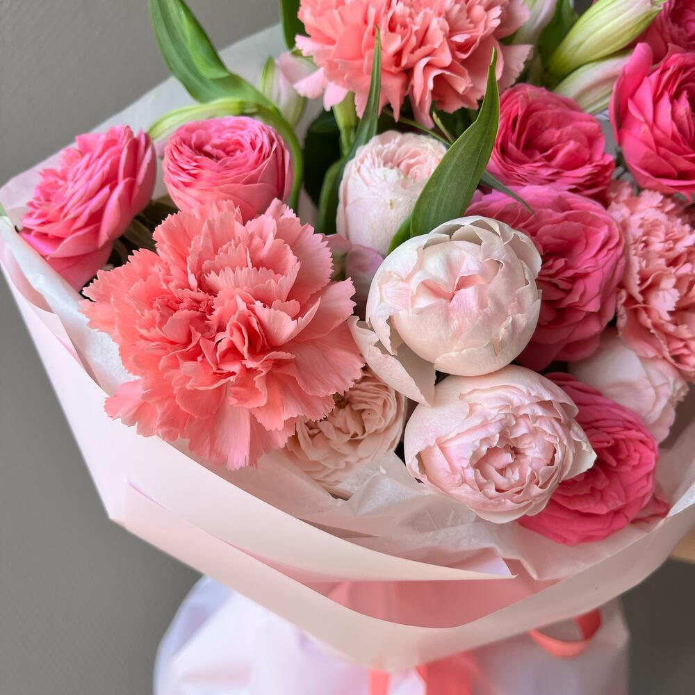 Author's bouquet with peony-shaped bush roses and dianthus