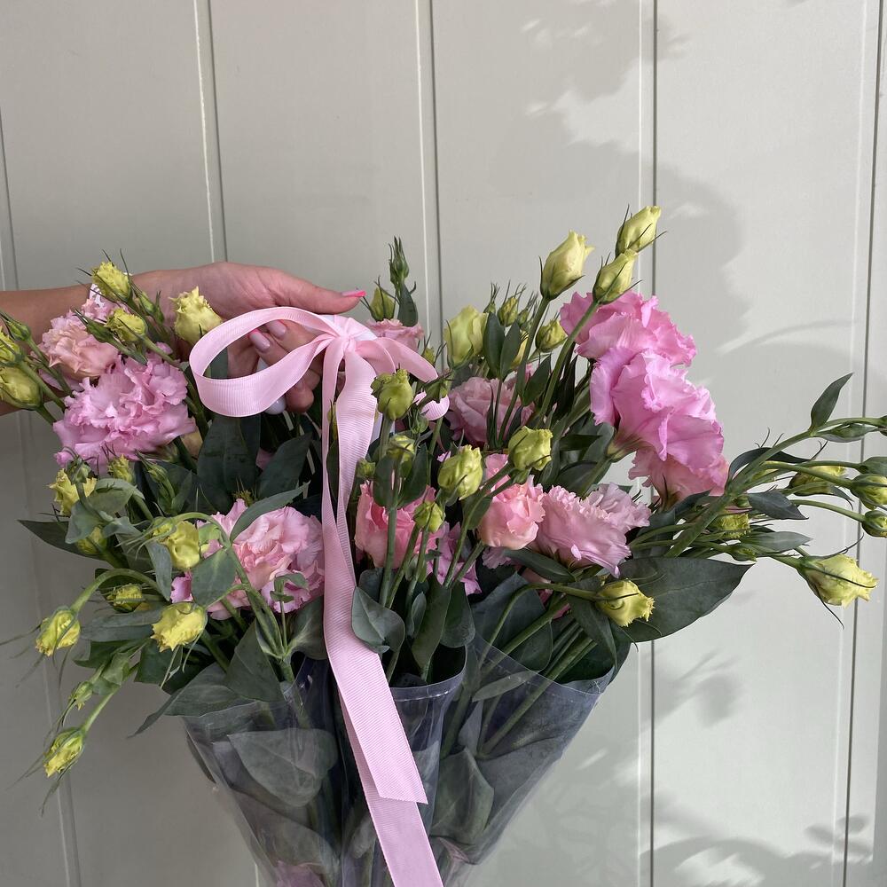 Eustoma arrangement in a transparent umbrella