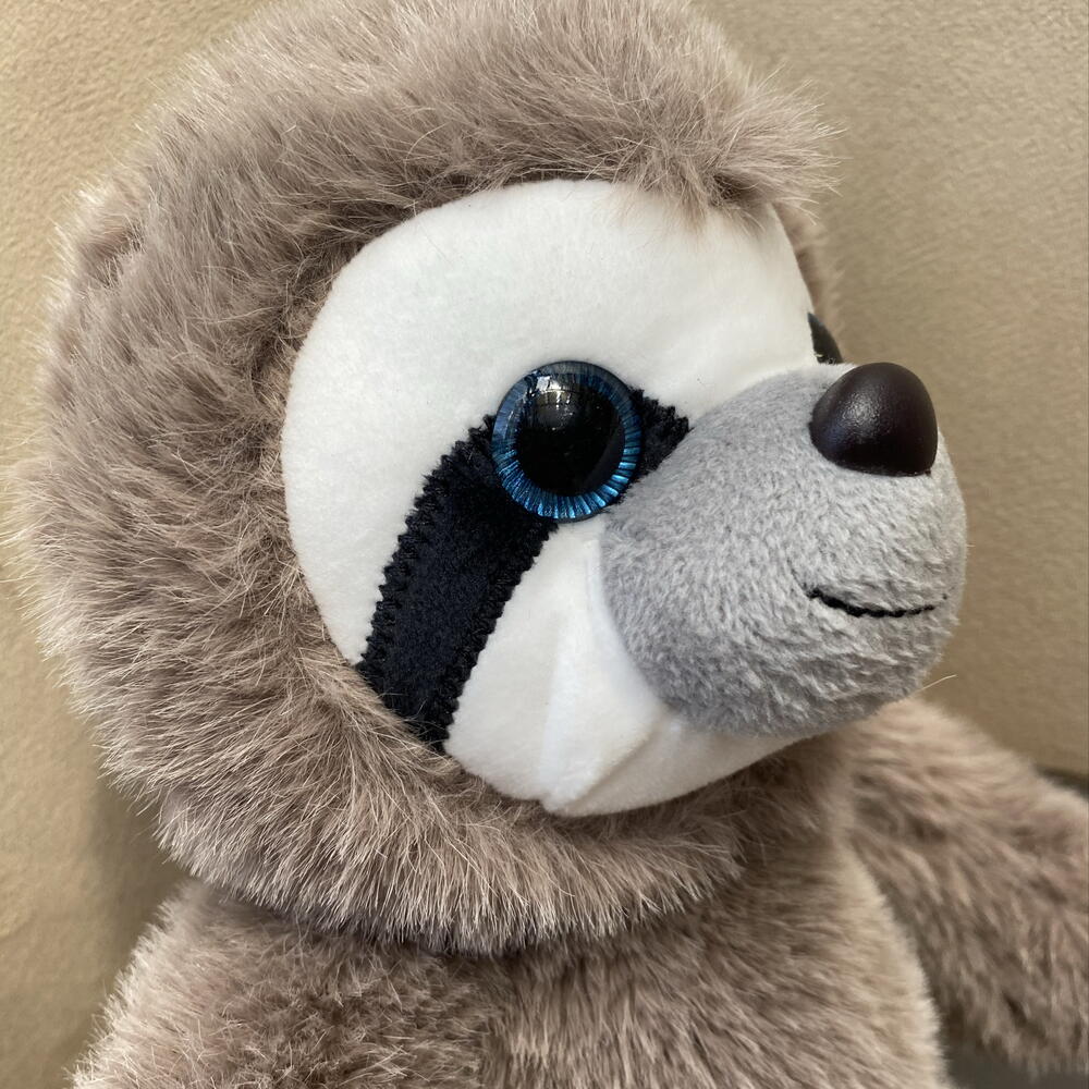 игрушка коричневый ленивец