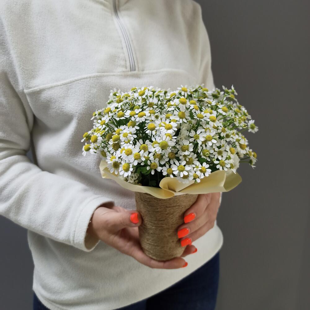 Букет ромашек в стакане