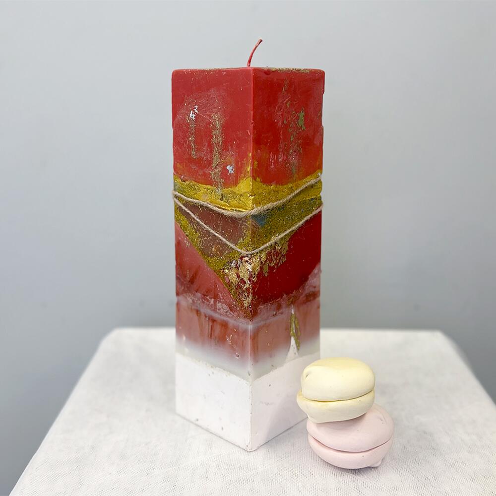 Designer red candle with gold