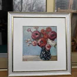 Still life with peony-shaped roses in a vase