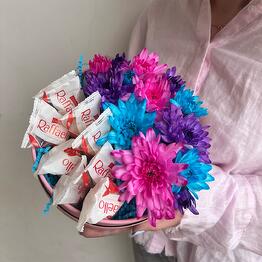 Composition with chrysanthemums and sweets