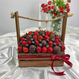 A box of chocolate-covered strawberries M