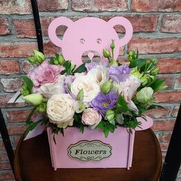 Oso de peluche con flores