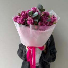 Bright bush rose with eucalyptus