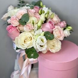 The Bride's bouquet in delicate colors, a boutonniere as a gift