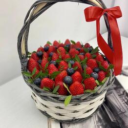 Basket with strawberries and blueberries Morning in the village of M